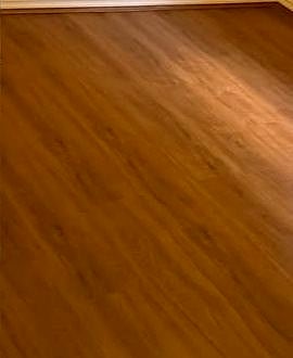 After: fresh timber boards in the bedroom