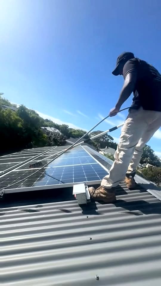 Everlast Maintenance Co cleaning rooftop solar panels in Adelaide